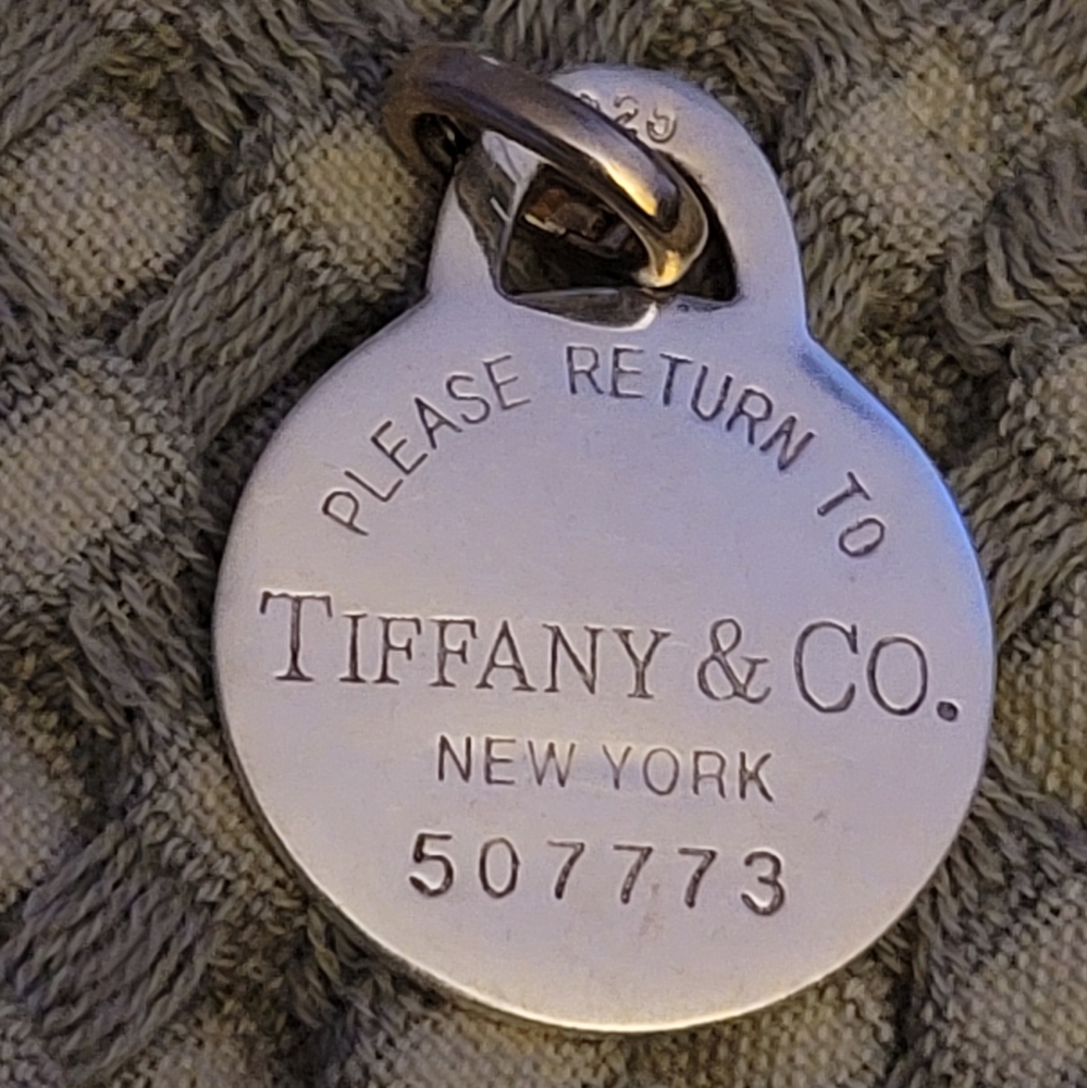 Please Return to Tiffany & Co Silver Round Tag Circle Charm or in Silver/ W/ COA